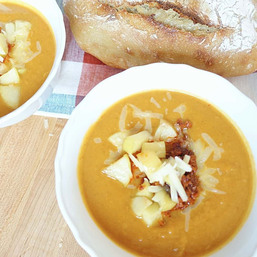 healthfully rooted home heart healthy chili spiced pumpkin and crispy chorizo chili with sourdough bread on the side