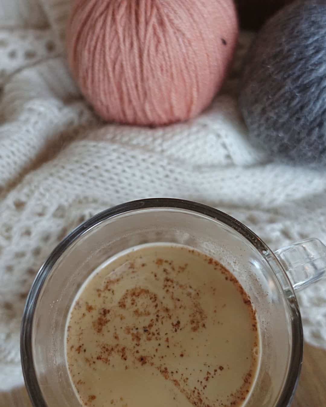 maple pecan latte with a cozy sweater and sweater pumpkins