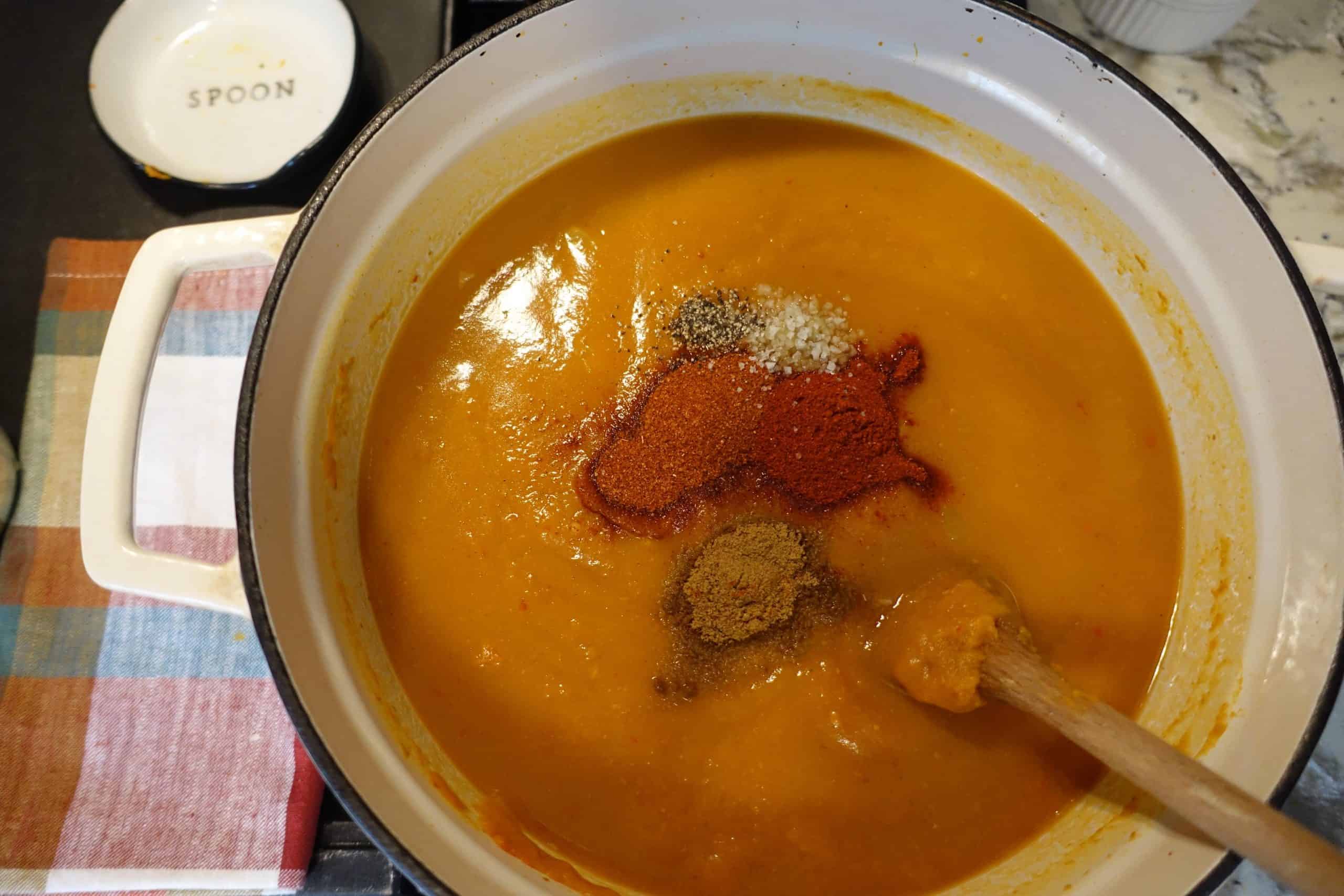 spiced pumpkin and chorizo chili with spices on pumpkin puree