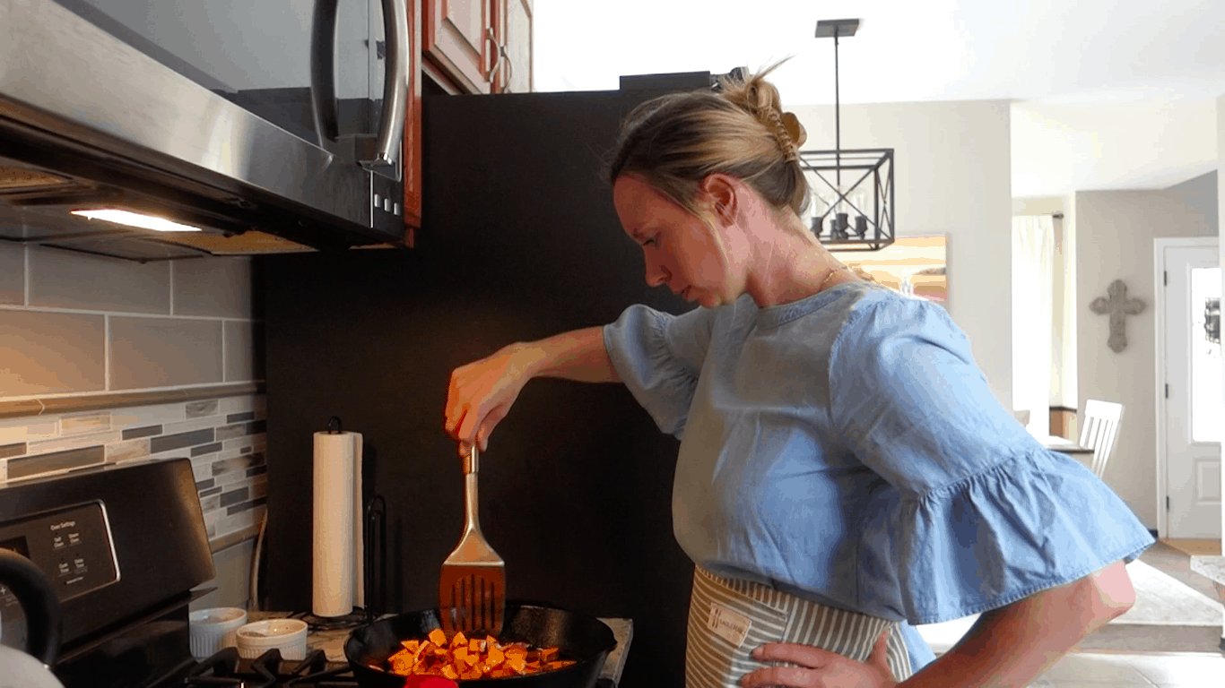 flipping sauteed sweet potatoes