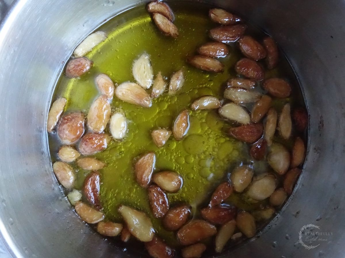 slow boiled garlic in olive oil to make garlic confit