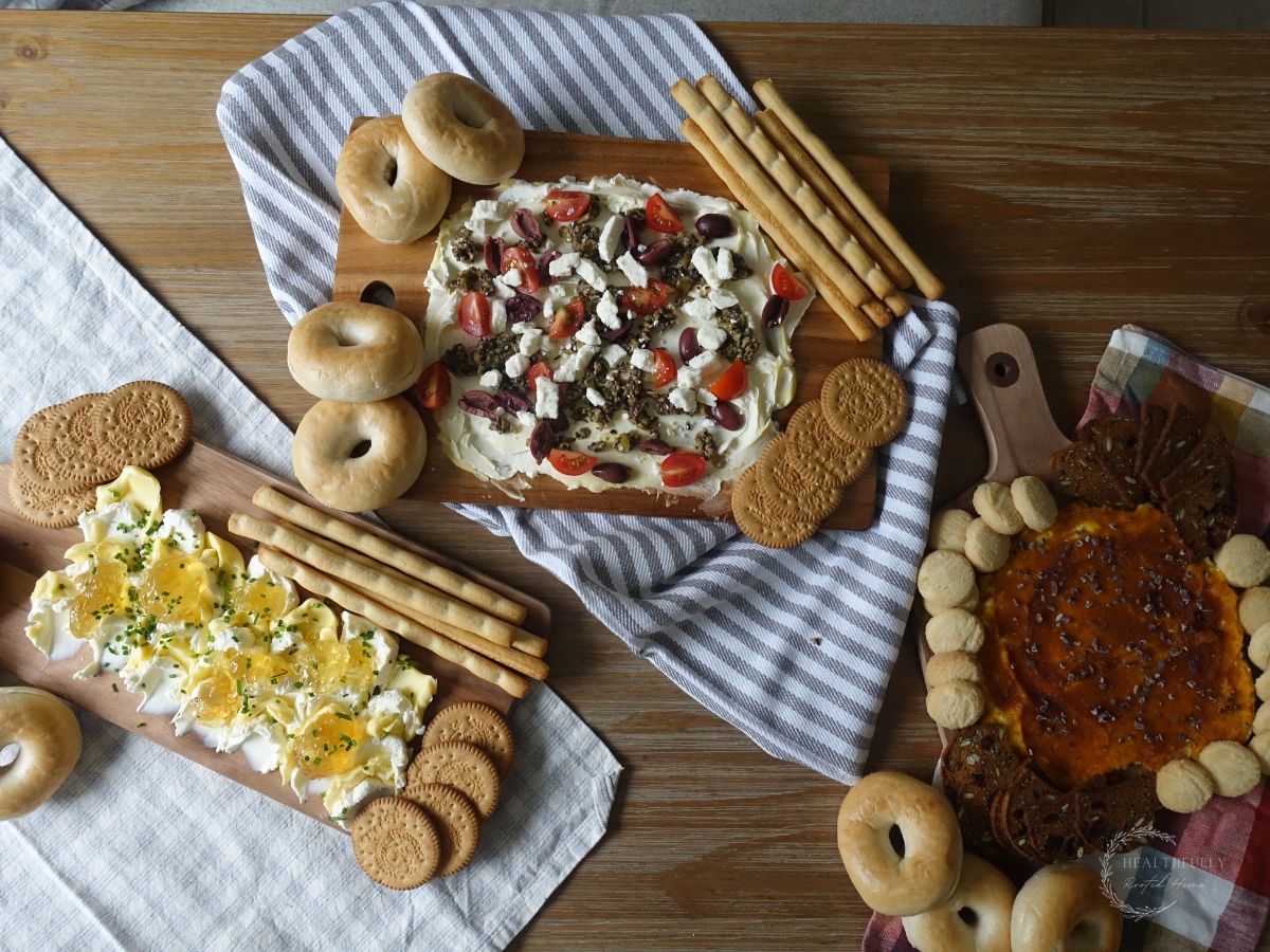 3 butter boards next to eachother pumpkin butter board greek butter board and pepper jelly butter board