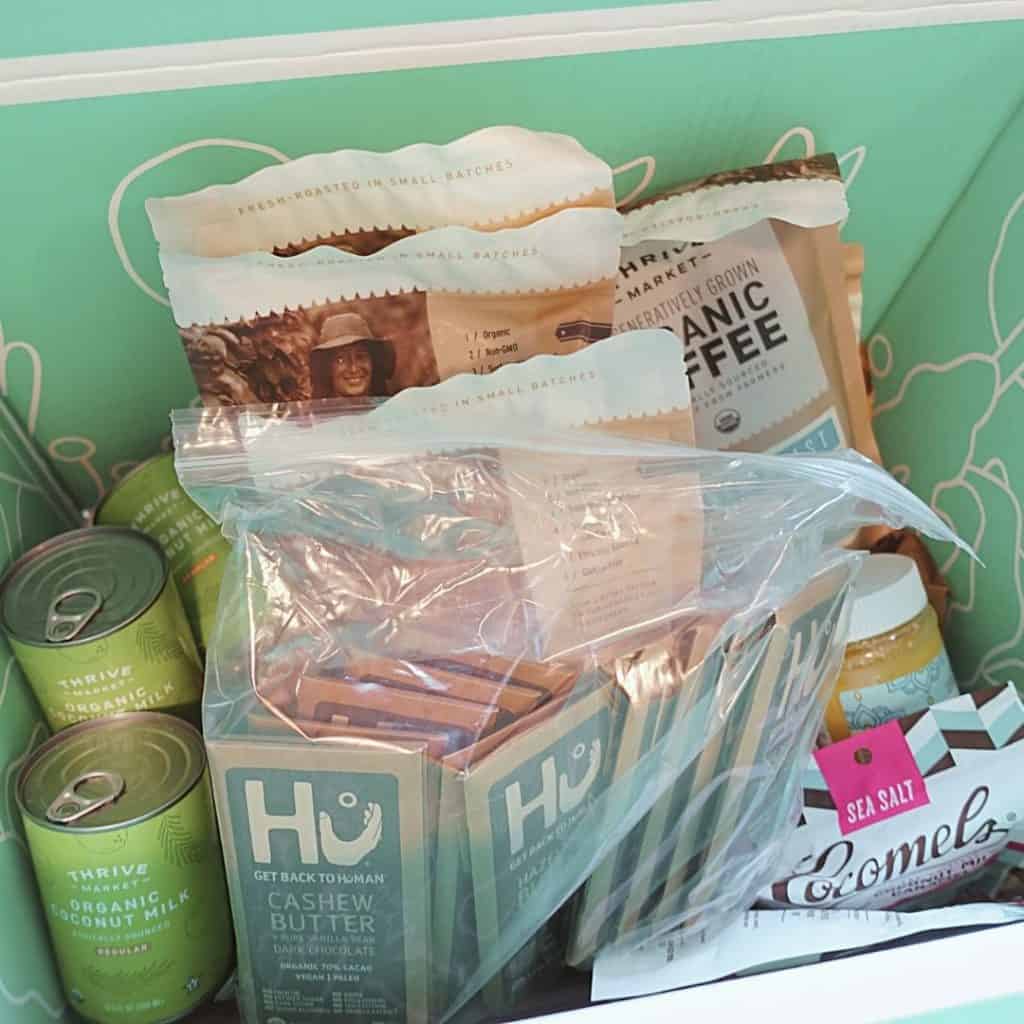 thrive market order in box with organic coffee human chocolate bars organic coconut milk and cocomels