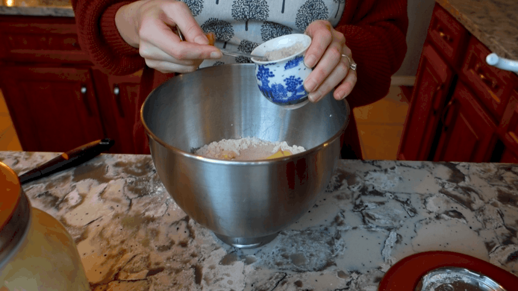mixing ingredients for cardamom sourdough bread recipe