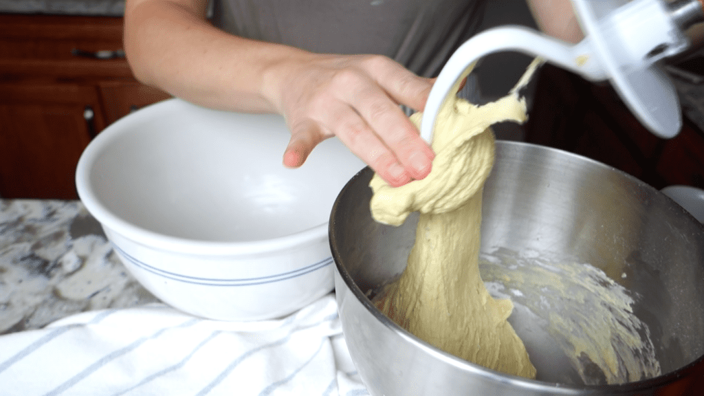 transferring einkorn sourdough tortillas from kitchenaid bowl to ceramic bowl