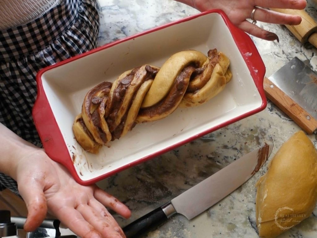 sourdough babka loaf in the loaf pan ready to proof