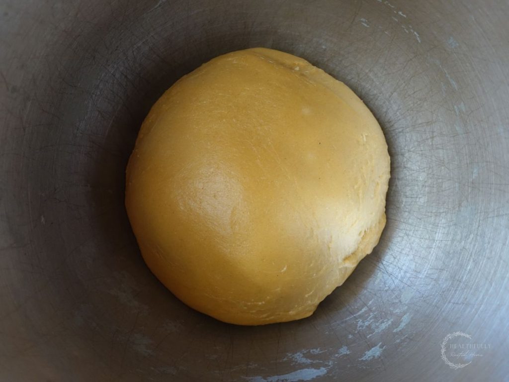 sourdough babka dough in a bowl during the bulk rise