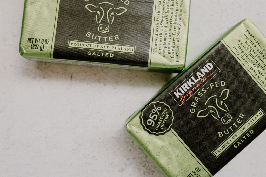 2 packs of butter being displayed on a white background as a substitute for applesauce