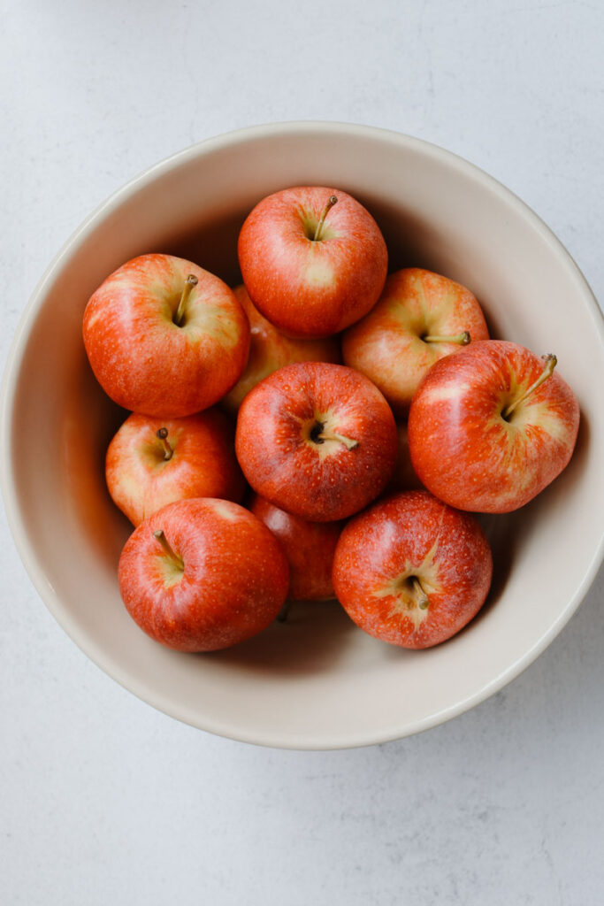 bowl of apples with a white background 