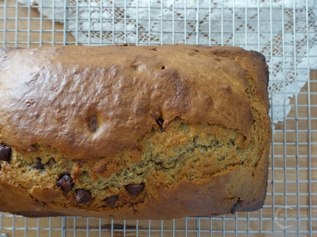 sourdough discard banana bread cooling on a wire cooling rack