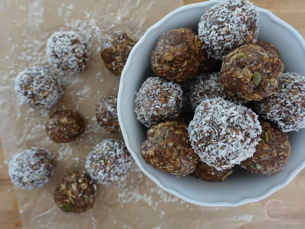 boobie balls in a white bowl with some spilling out onto some parchment paper