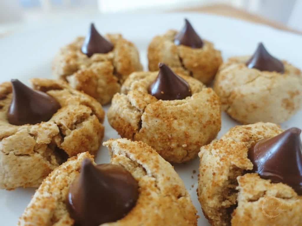 peanut kisses on a white plate in a circle