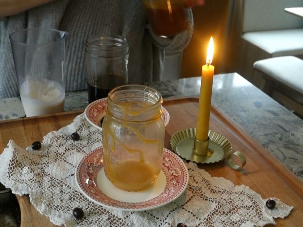 cup with drizzled salted caramel sauce throughout
