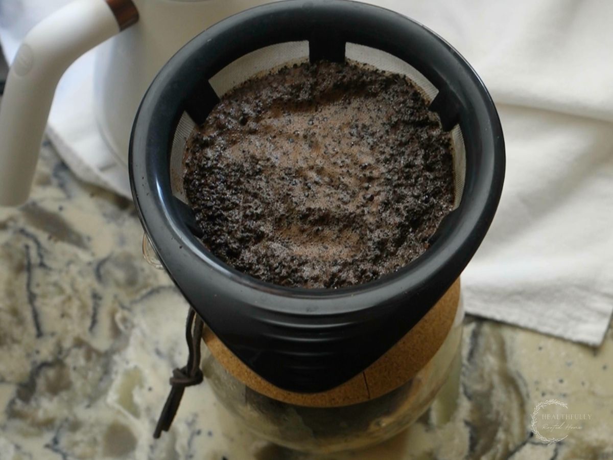 second pour hand drip coffee letting the coffee drain