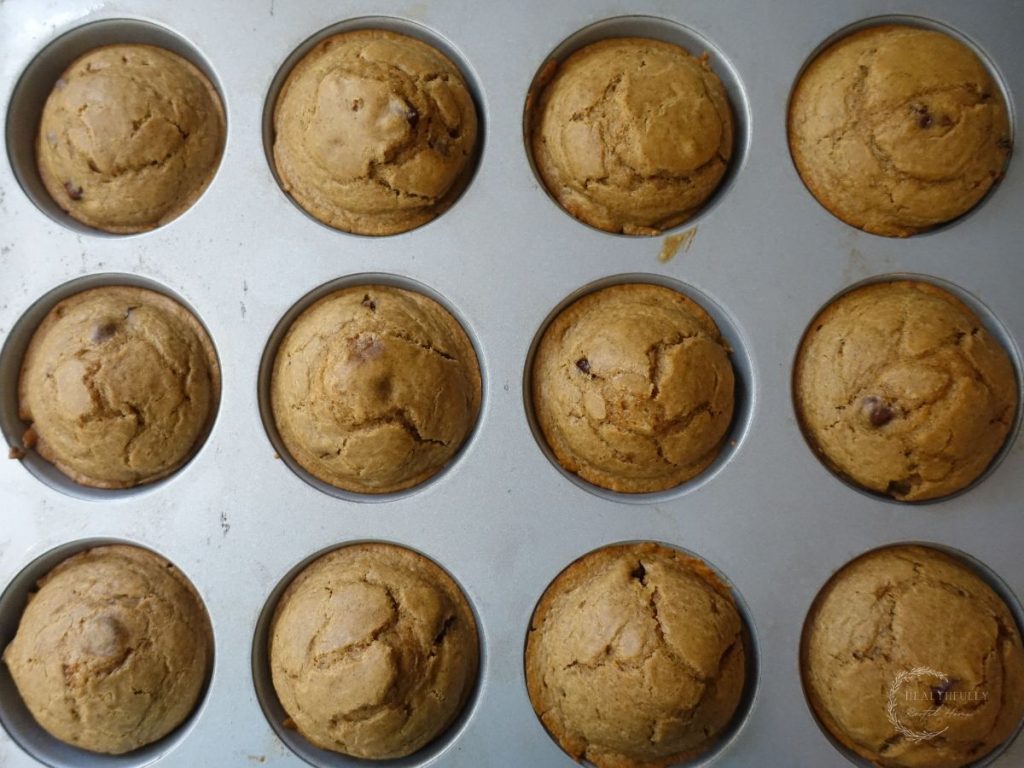 baked sourdough discard muffins in a muffin tin