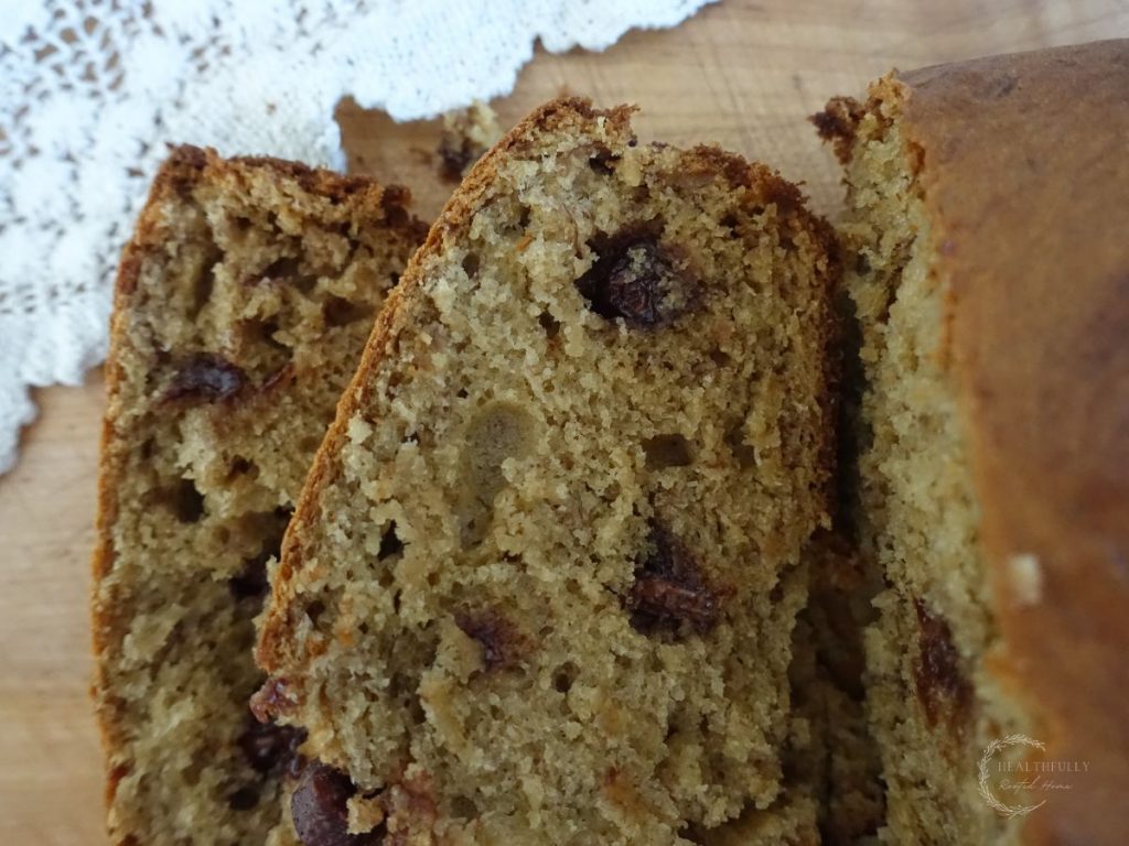sourdough discard banana bread sliced zooming in on the chocolate chips in the bread