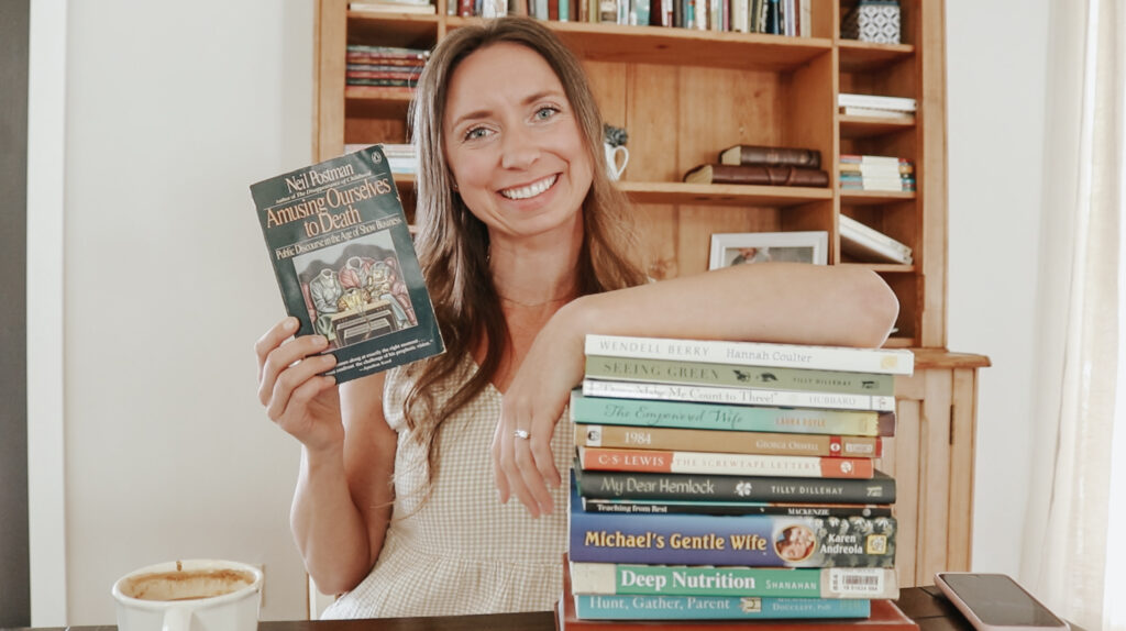A Christian homemaker leans on a stack of books that changed her life.