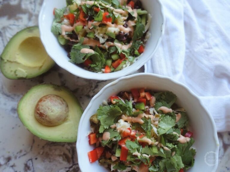 taco bowls with cilantro avocado and ancho aioli in white bowls