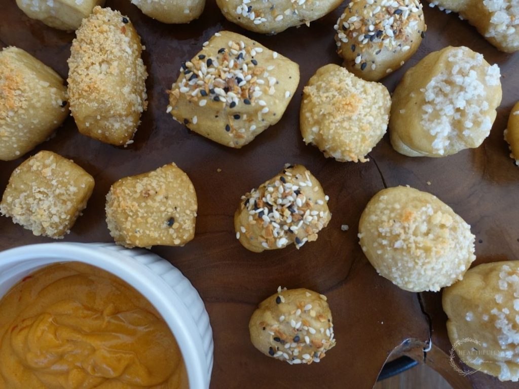 close up of baked sourdough pretzel bites with everything bagel seasoning