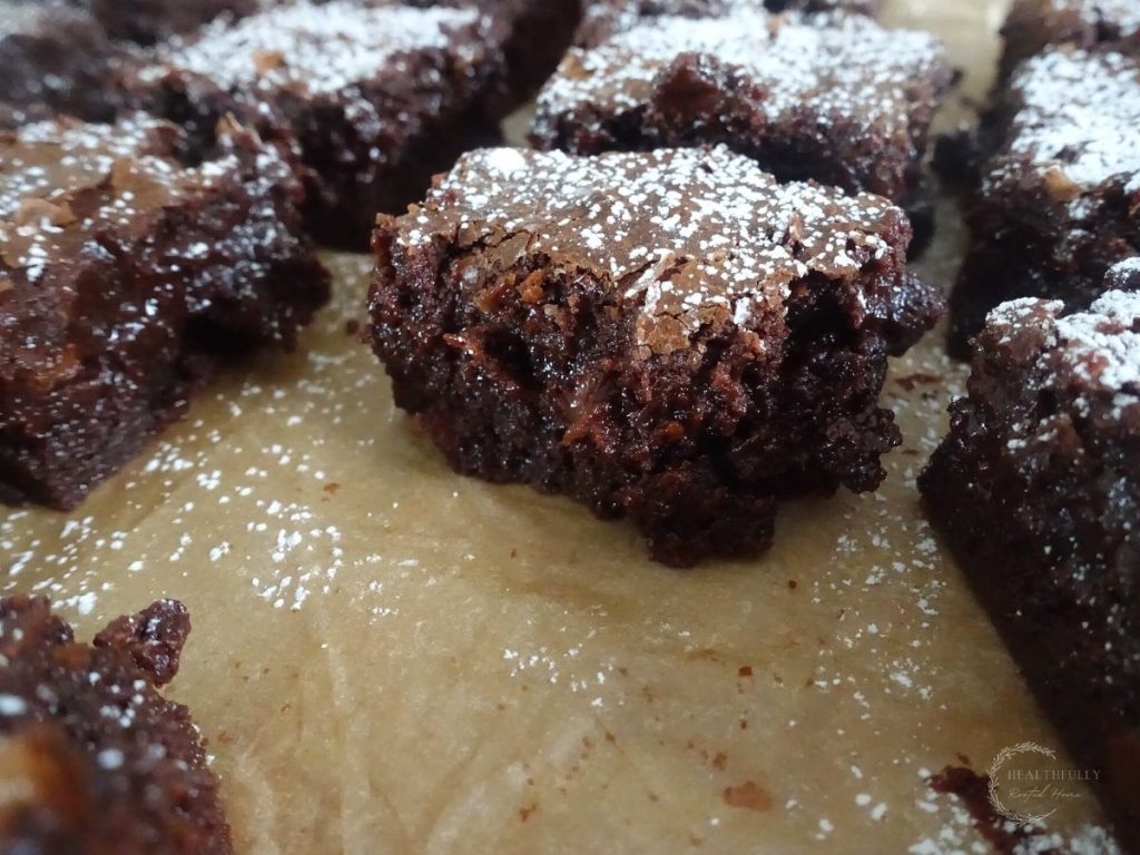 brownies with one bite taken out of one so you can see the fudgy center
