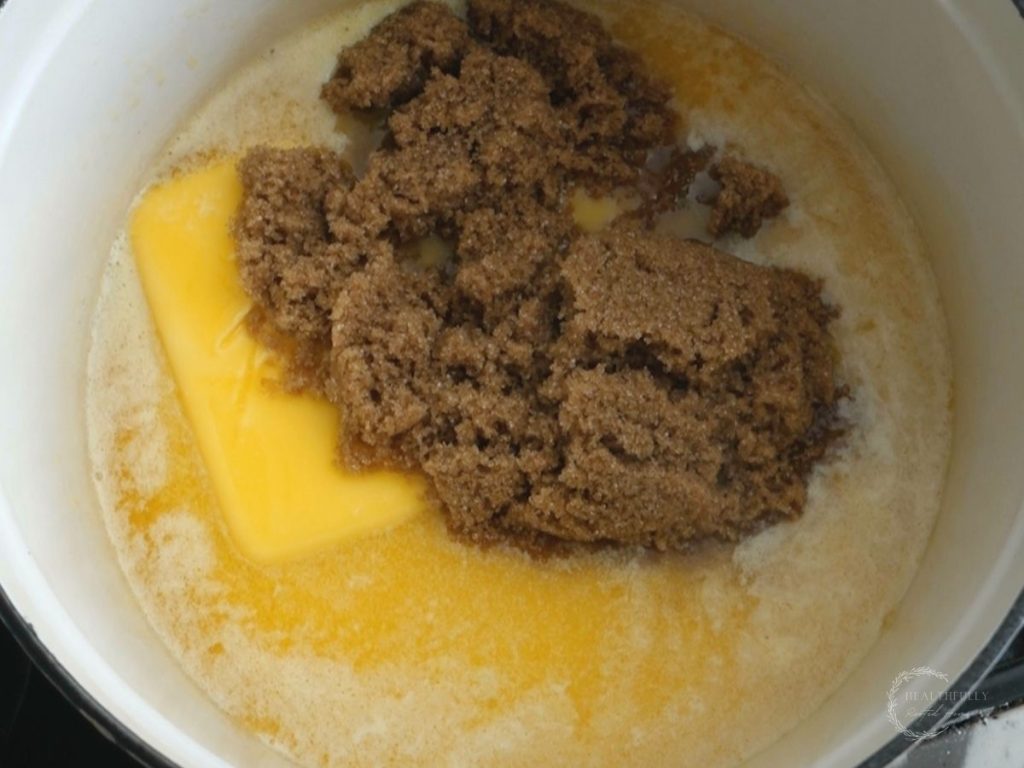 melted butter with brown sugar in a white dutch oven