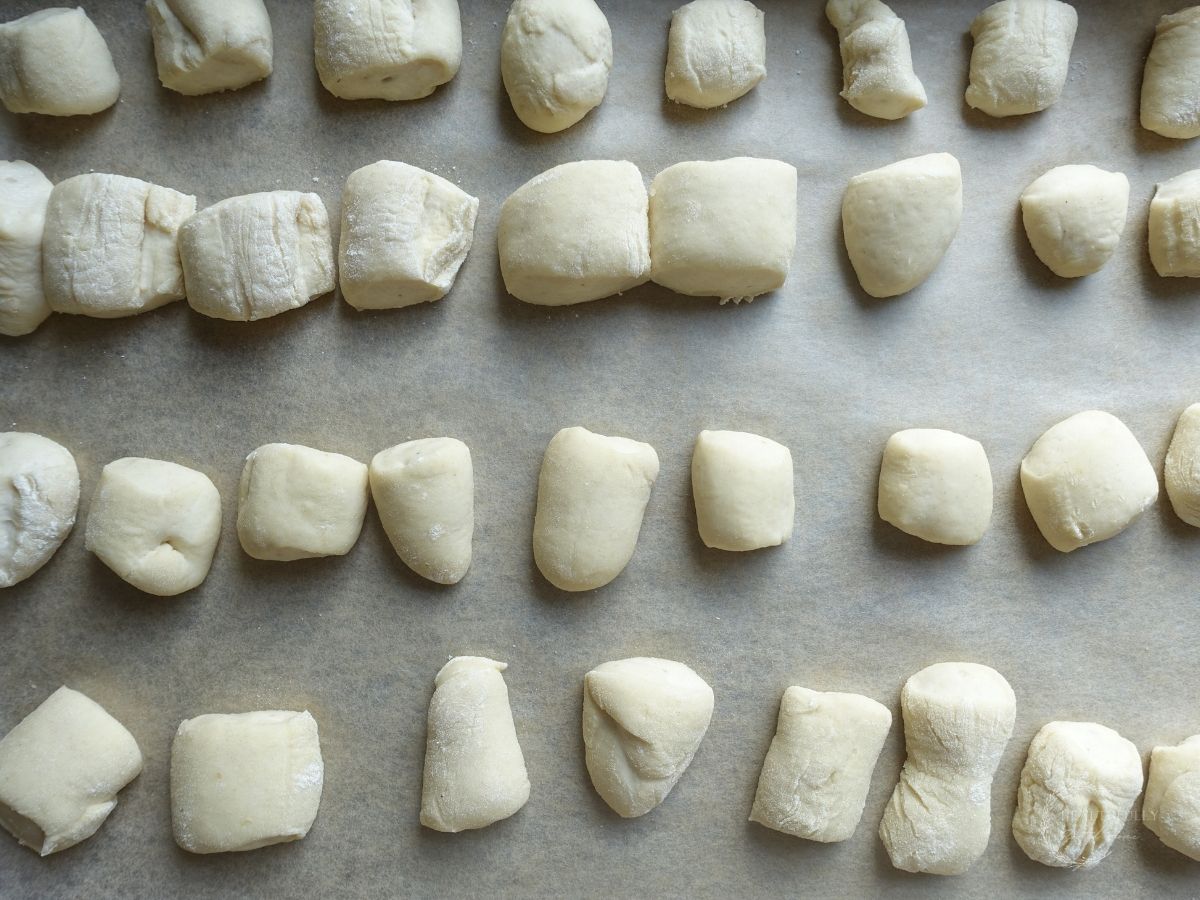 puffed up sourdough pretzel bites after the final rise ready for boiling
