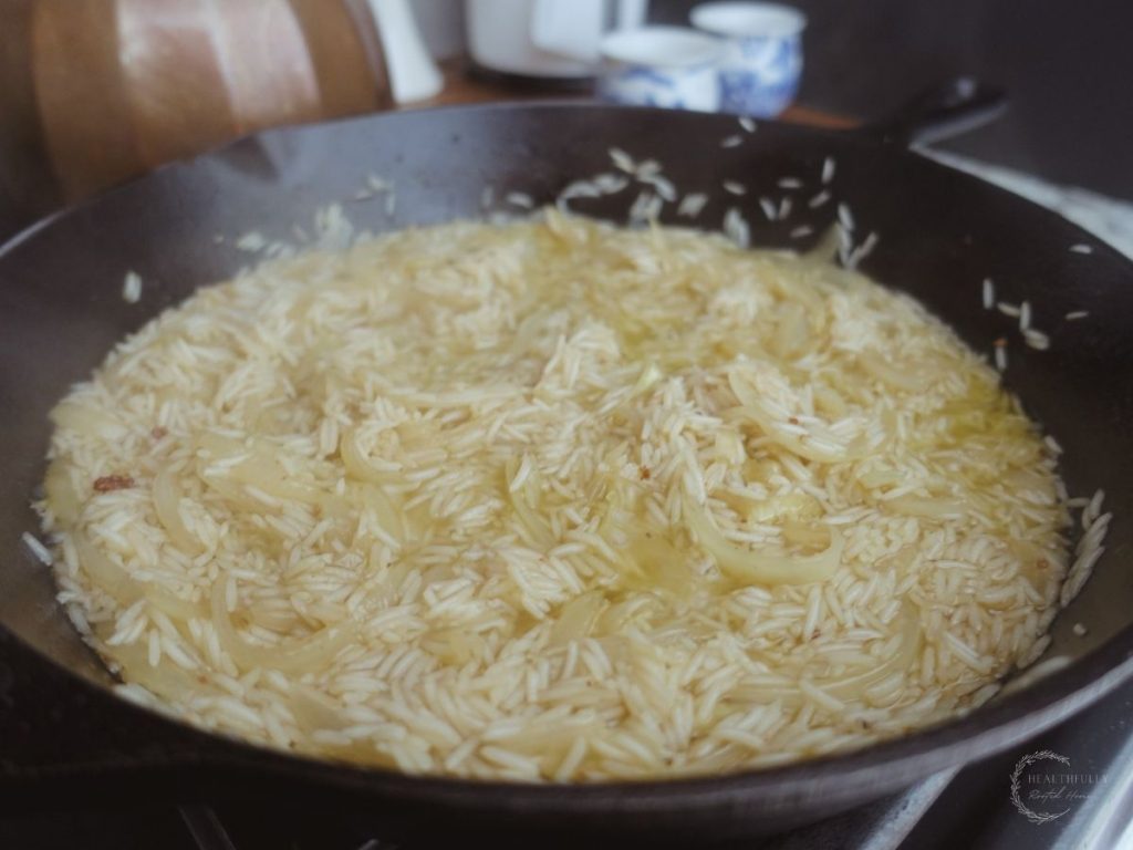 risotto basmati in a cast iron skillet after soaking up bone broth