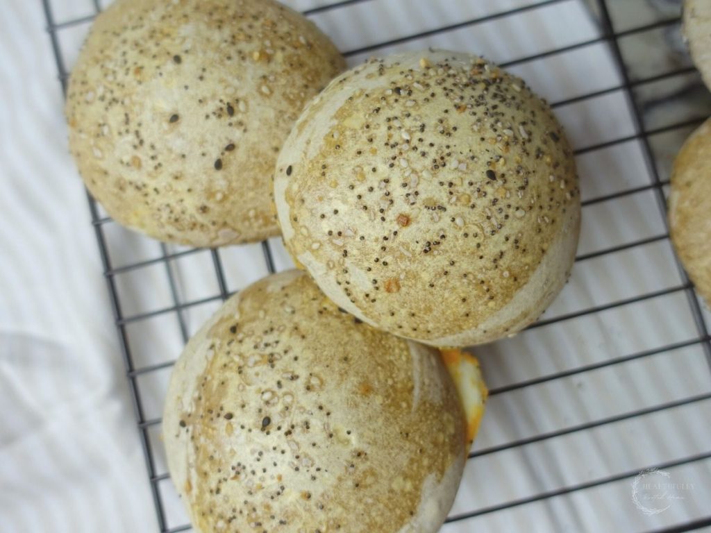 sourodugh burger buns cooling on a wire cooling rack 